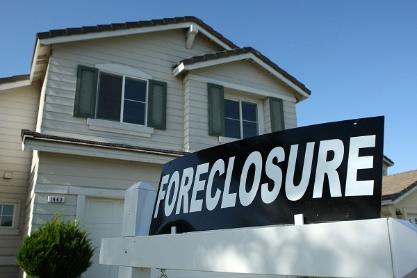 Foreclosure sign in front of home